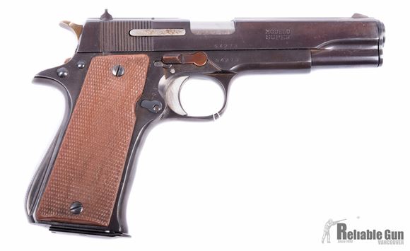 Picture of Used Star "Modelo Super" Semi Auto Pistol,  9mm, 5'' Barrel, Fixed Sight,  2 Mags, Very Good Condition.  Has magazine cutoff.