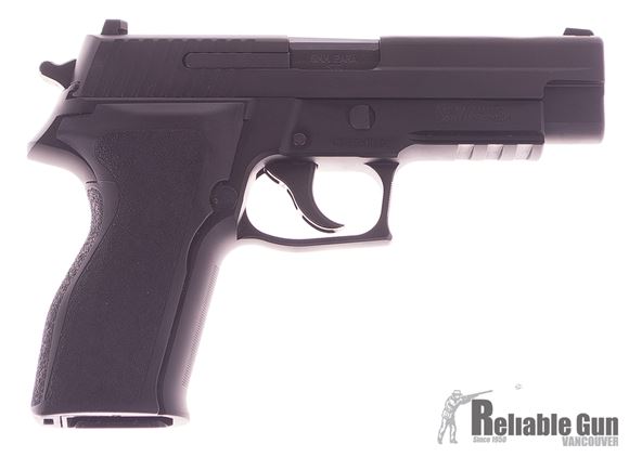Picture of Used Sig Sauer P226 E2, Semi Auto Pistol, 9mm, Threee Dot Sights, 4 Magazines, Original Box, Good Condition