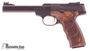 Picture of Used Browning Buck Mark Plus UDX Rimfire Semi-Auto Pistol - 22 LR, 5-1/2", Matte Blued Polished Flats Slabside, Walnut Laminated Ultragrip DX Ambidextrous Grip, 2x10rds, TruGlo/Marble's Fiber-Optic Front & Adjustable Pro-Target Rear Sights, Excellent