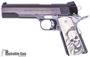 Picture of SVI Infinity 1911 45 ACP,  Blued w/Silver Silde Release, Hammer & Safety, Kart 45 NM Barrel, Ivory Color Grip w/Grim Reaper Logo, 1  Magazine, Very Good Condition