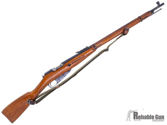 Picture of Used Mosin Nagant 91/30 Bolt Action Rifle, 7.62x54R, 1941 Production, Izhevsk USSR, Re-arsenalled in Balakleya, Matching Serial Numbers, Reproduction Sling, Comes with Soft Case and Trigger Lock, Surplus Condition