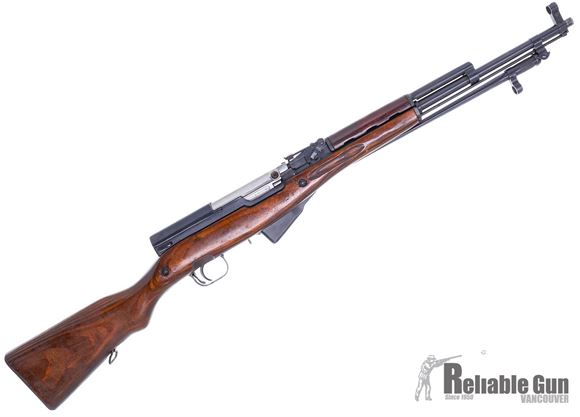 Picture of Used Russian SKS Semi Auto Rifle - 7.62x39mm, Laminate Stock, Spike Bayonet, Spring Loaded Firing Pin, 1949 Tula 1st Gen Mfg, Mostly Matching #'s, Wood Presentation Case, Sling & Accessories, Good Condition