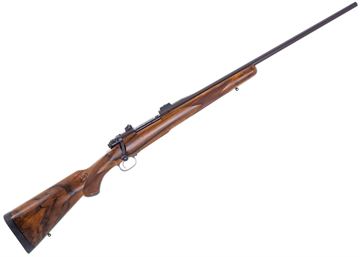 Picture of Used Dakota Arms Model 76 Bolt Action Rifle, 7mm Rem Mag, 23" Barrel, Control Round Feed Action, 3 Position Safety, Custom Machined Leupold STD Style Scope Bases, Black Walnut Stock, Excellent Condition