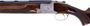 Picture of Used Browning Superposed B2 International Skeet Over Under Shotgun, 12-Gauge, 28'' Barrel Fixed Skeet, Coin Finish Receiver w/Hand Engraved Game Scene, Walnut Stock  13-3/4" LOP With Kick EEZ Pad, 1972 Production, Made In Belgium, Includes Browning Take