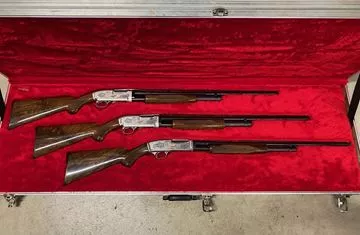 Picture of Used Browning Three Gun Ducks Unlimited Edition Set of Model 12s/42 Pump Action Shotguns, 20ga, 28ga, 410-Bore, All Engraved with Pheasant/Duck Gold Inlay, All 26" Vent Ribbed Barrels, Three Gun Presentation Case, Some Small Marks Otherwise Excellent Con