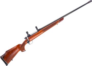 Picture of Used Tikka M65 Deluxe Bolt Action 300 Win Mag, 24'' Heavy Barrel w/ Muzzlebrake, Blued, With Tikka 1" Rings, One Mag, Recoil Pad Loose, Overall Good Condition
