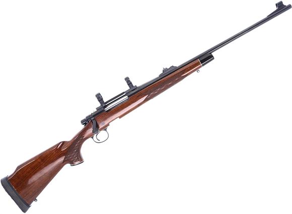Picture of Used Remington 700 BDL Bolt-Action Rifle, 30-06 Sprg, 22" Barrel, Blued, Wood Stock, DBM Bottom Metal, Leupold Scope Rail w/ 1" Rings, One Mag, Worn Limbsaver Pad, Very Good Condition
