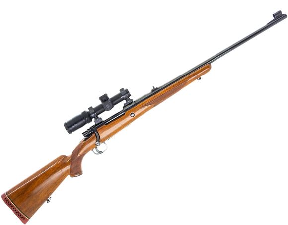 Picture of Used FN Deluxe Mauser 98, 375 H&H, 24'' Barrel w/ Three Leaf Safari Style Sights, Hooded Front Sight, Adjustable Trigger w/Trigger Shoe, Elite 4500 1-4x24 Scope, Talley 30mm QR Rings, Walnut Stock, Camo Soft Case - Very Good Condition