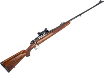 Picture of Used Frank Pachmayr Custom Mauser Bolt-Action 7mm Rem Mag, 24" Barrel w/ Sights, With 1" Tip-Off Scope Mount, Brazilian Walnut Stock, Grip-Cap Medalliion Says: "Donated by Nan & Frank Pachmayr to Wetlands for Iowa", Excellent Condition