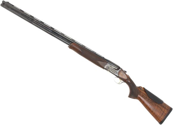 Picture of Used Caeser Guerini Summit Left Hand Over Under, 12-Gauge, 32'' Barrels, Case Hardened Receiver, Checkered Walnut Stock w/Cheek Protector, 5 Extended Chokes, Original Case, Some Finish Wear On Bottom Of Receiver And Trigger Guard, Good Condition